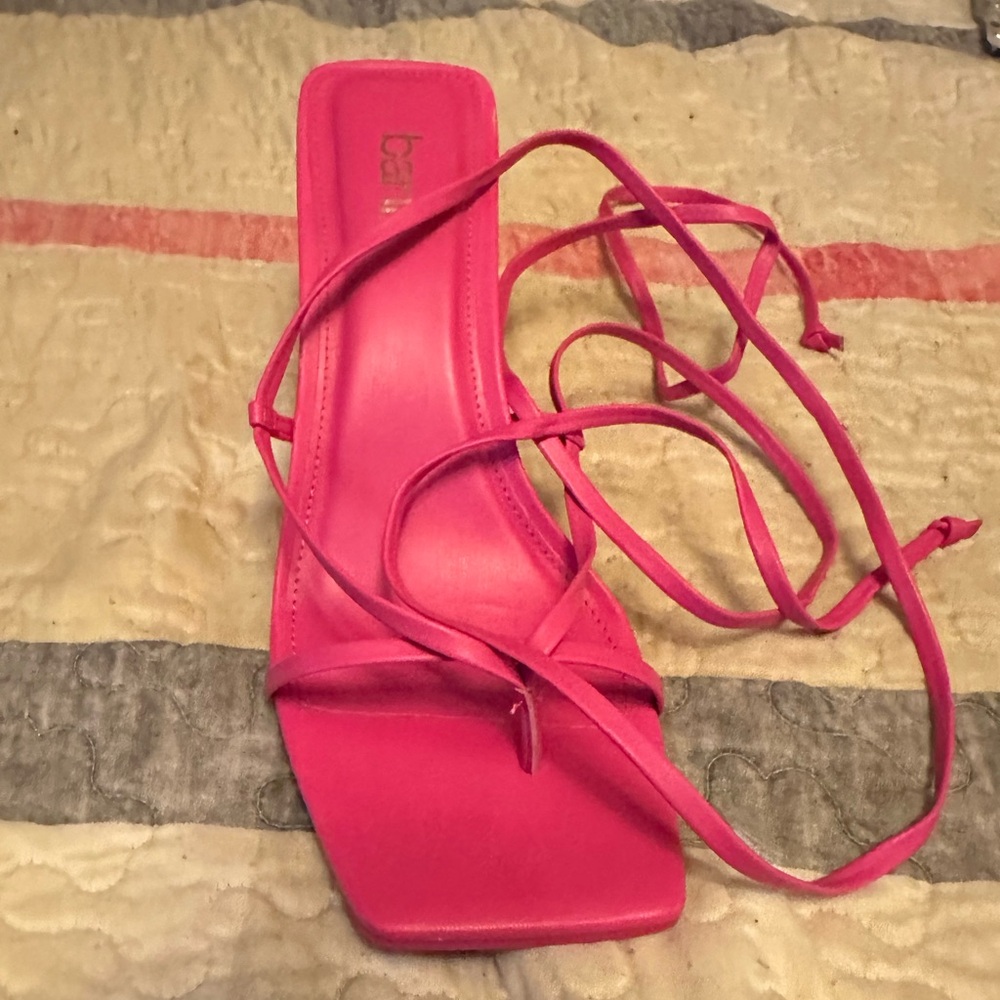 Hot pink sandals that tie up your legs, never been worn. No box